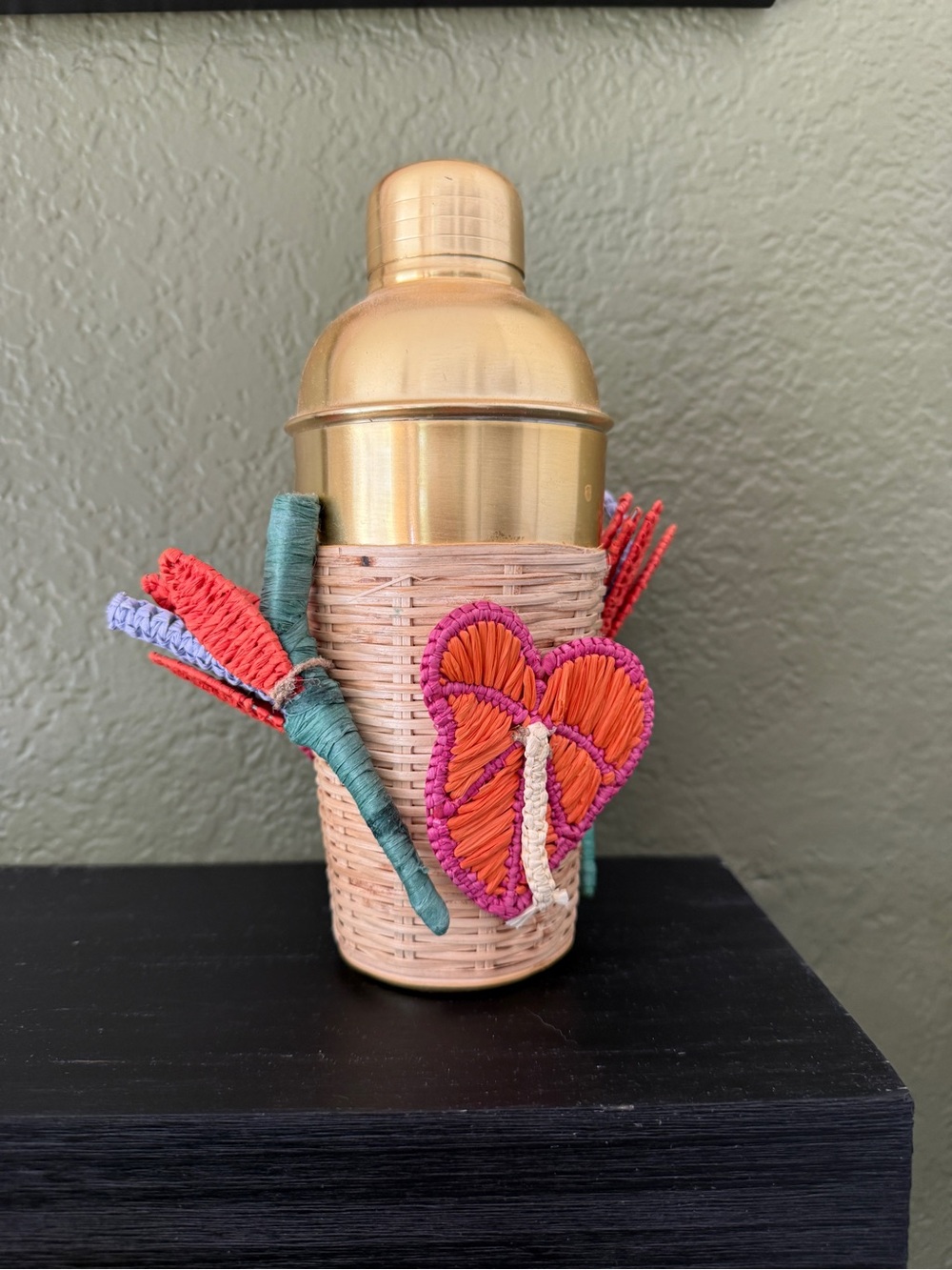 Gold Cocktail Shaker with Woven Rattan Sleeve and Colorful Embellishments